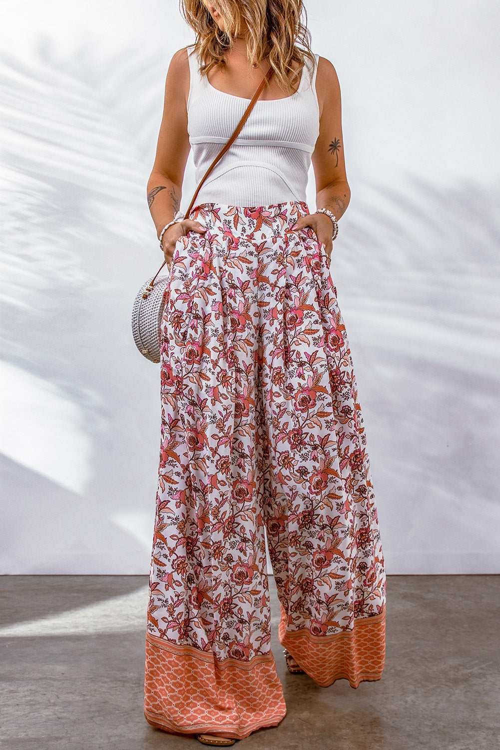 Floral shirred high waist wide leg pant.